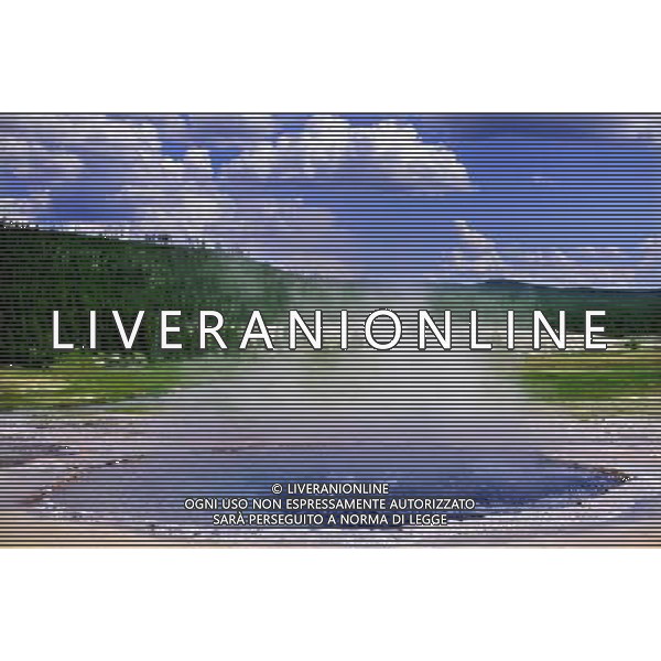 (110821) -- NEW YORK, Aug. 21, 2011 () -- Photo taken on Aug. 7, 2011 shows the scenery of Old Faithful in Yellowstone National Park, the United States. Established in 1872, Yellowstone is a national park located primarily in the state of Wyoming, although it also extends into Montana and Idaho. Yellowstone was the first national park in the world and is known for its wildlife and its many geothermal features. (/Shen Hong) (wjd)