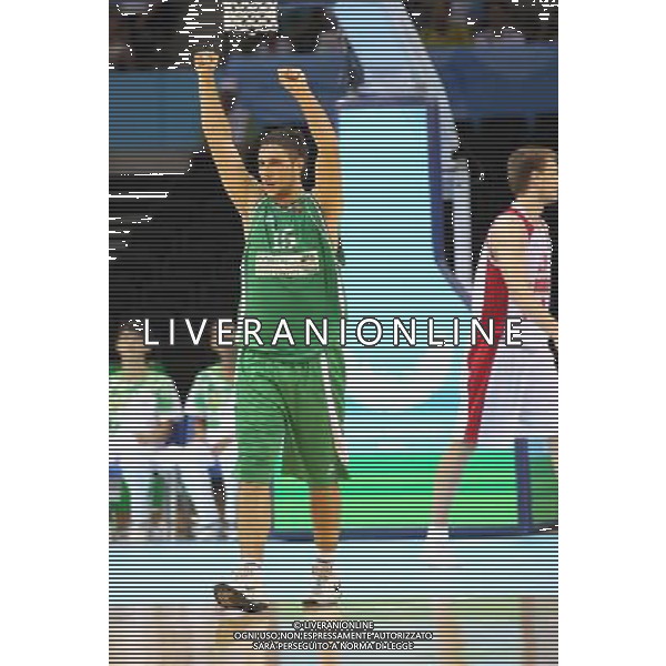 (110822) -- SHENZHEN, Aug. 22, 2011 () -- Gediminas Orelik of Lithuania celebrates after winning the bronze medal match of basketball against Russia at the 26th Summer Universiade in Shenzhen, a city of south China\'s Guangdong Province, Aug. 22, 2011. Lithuania won the match 76:74 and claimed the bronze medal of the event. (/Meng Yongmin)