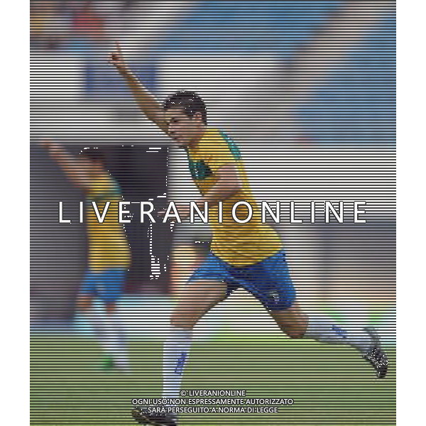 (110822) -- SHENZHEN, Aug. 22, 2011 () -- Thiago Florencio of Brazil celebrates for a goal during the men\'s bronze medal football match between Brazil and Russia at the 26th Summer Universiade in Shenzhen, a city of south China\'s Guangdong Province, Aug. 22, 2011. Brazil won 2-0 to win the bronze. (/Li Ga)(lm)
