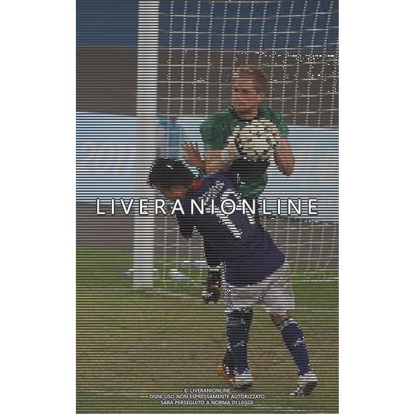 (110822) -- SHENZHEN, Aug. 22, 2011 () -- Nobuyuki Shiina (below) of Japan vies with Nicholas Dean Jupp, goalkeeper of Great Britain, during their men\'s football final at the 26th Summer Universiade in Shenzhen, a city of south China\'s Guangdong Province, Aug. 22, 2011. Japan won 2-0 to win the gold. (/Bai Xuefei)(lm)