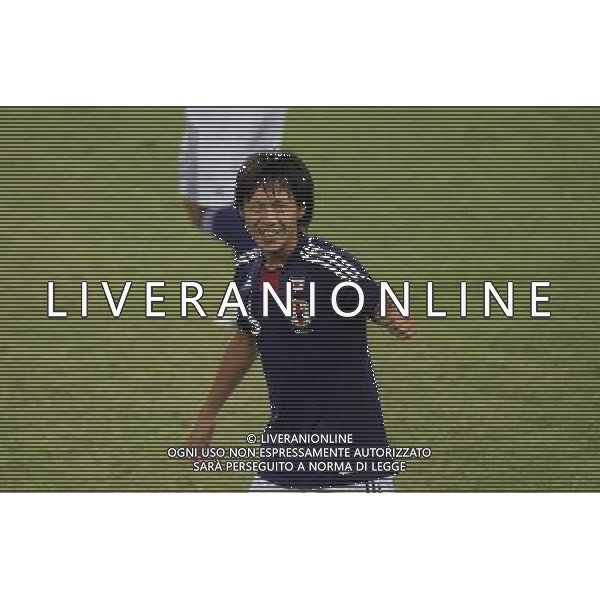 (110822) -- SHENZHEN, Aug. 22, 2011 () -- Akito Kawamoto of Japan gestures during the men\'s football final between Japan and Great Britain at the 26th Summer Universiade in Shenzhen, a city of south China\'s Guangdong Province, Aug. 22, 2011. Japan won 2-0 to win the gold. (/Bai Xuefei)(lm)