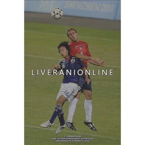 (110822) -- SHENZHEN, Aug. 22, 2011 () -- Akito Kawamoto (L) of Japan vies with Kieran Thomas Murphy of Great Britain during their men\'s football final at the 26th Summer Universiade in Shenzhen, a city of south China\'s Guangdong Province, Aug. 22, 2011. Japan won 2-0 to win the gold. (/Chen Yehua)(lm)