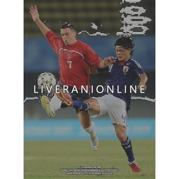 (110822) -- SHENZHEN, Aug. 22, 2011 () -- Makoto Rindo (R) of Japan competes during the men\'s football final between Japan and Great Britain at the 26th Summer Universiade in Shenzhen, a city of south China\'s Guangdong Province, Aug. 22, 2011. (/Li Ga)(lm)