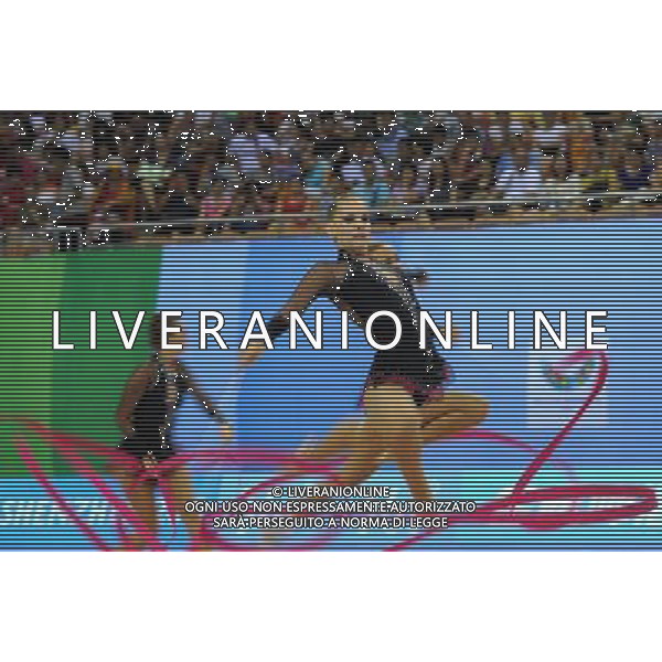 (110822) -- SHENZHEN, Aug. 22, 2011 () -- The Hungarian group competes during the 3 ribbons+2 hoops final of rhythmic gymnastics at the 26th Summer Universiade in Shenzhen, a city of south China\'s Guangdong Province, Aug. 22, 2011. The Hungarian group ranked the 4th of the event with a total of 21.000. (/Liu Dawei)