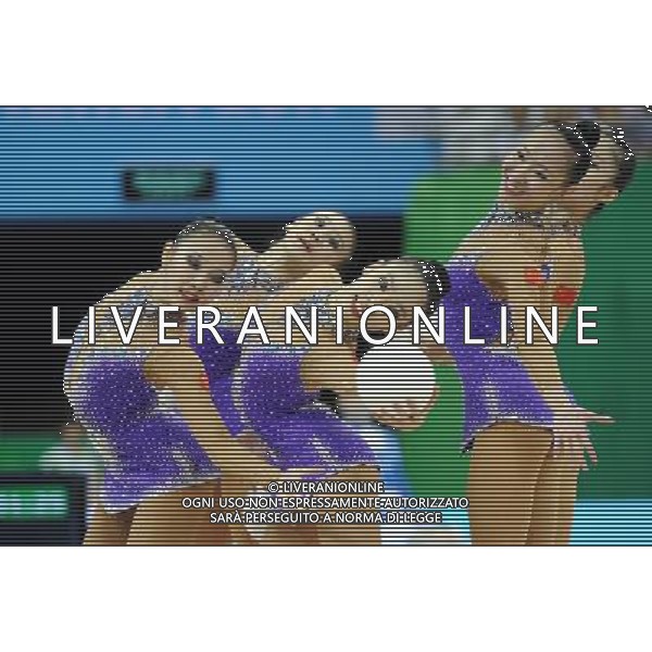(110822) -- SHENZHEN, Aug. 22, 2011 () -- The Chinese group competes during the 5 balls final of rhythmic gymnastics at the 26th Summer Universiade in Shenzhen, a city of south China\'s Guangdong Province, Aug. 22, 2011. The Chinese group won the gold medal of the event with a total of 26.950. (/Liu Dawei)