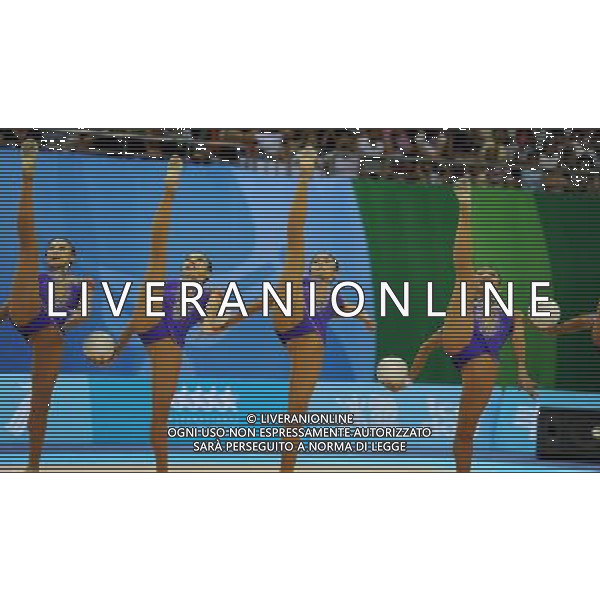 (110822) -- SHENZHEN, Aug. 22, 2011 () -- The Chinese group competes during the 5 balls final of rhythmic gymnastics at the 26th Summer Universiade in Shenzhen, a city of south China\'s Guangdong Province, Aug. 22, 2011. The Chinese group won the gold medal of the event with a total of 26.950. (/Guo Yong)