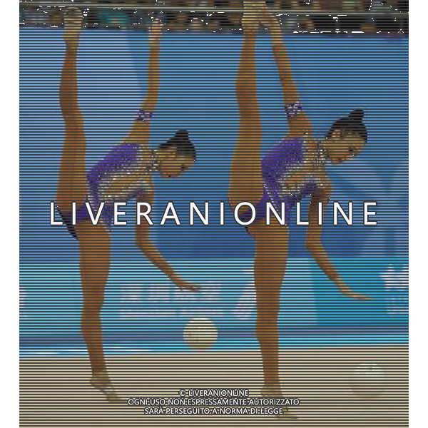 (110822) -- SHENZHEN, Aug. 22, 2011 () -- The Chinese group competes during the 5 balls final of rhythmic gymnastics at the 26th Summer Universiade in Shenzhen, a city of south China\'s Guangdong Province, Aug. 22, 2011. The Chinese group won the gold medal of the event with a total of 26.950. (/Guo Yong)