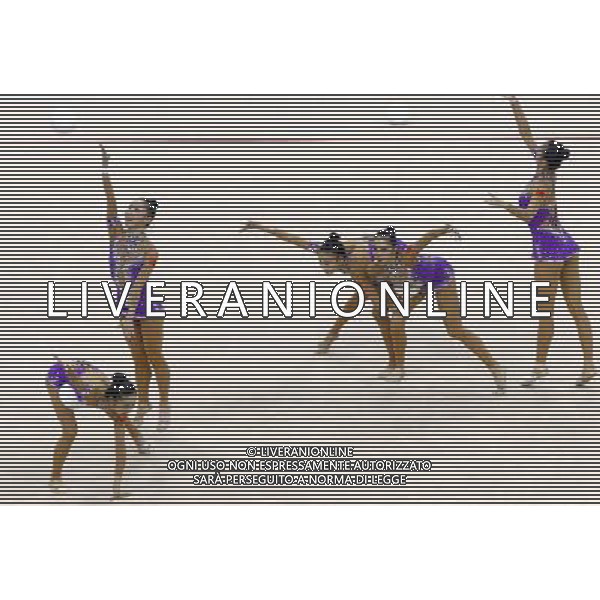 (110822) -- SHENZHEN, Aug. 22, 2011 () -- The Chinese group competes during the 5 balls final of rhythmic gymnastics at the 26th Summer Universiade in Shenzhen, a city of south China\'s Guangdong Province, Aug. 22, 2011. The Chinese group won the gold medal of the event with a total of 26.950. (/Chen Jianli)