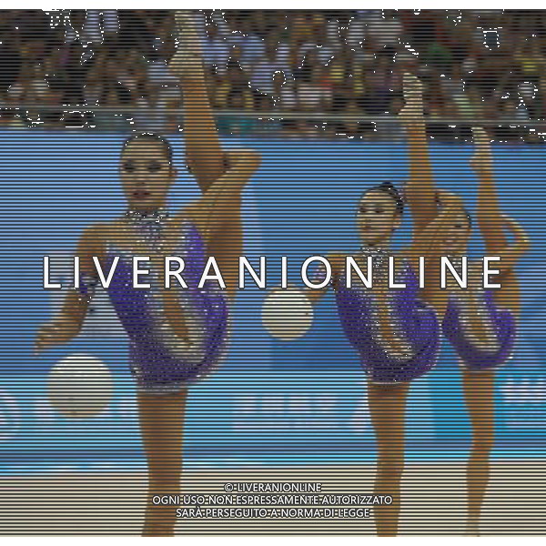 (110822) -- SHENZHEN, Aug. 22, 2011 () -- The Chinese group competes during the 5 balls final of rhythmic gymnastics at the 26th Summer Universiade in Shenzhen, a city of south China\'s Guangdong Province, Aug. 22, 2011. The Chinese group won the gold medal of the event with a total of 26.950. (/Guo Yong)