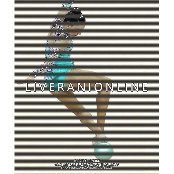 (110822) -- SHENZHEN, Aug. 22, 2011 () -- Liubou Charkashyna of Belarus competes during the individual ball final of rhythmic gymnastics at the 26th Summer Universiade in Shenzhen, a city of south China\'s Guangdong Province, Aug. 22, 2011. Liubou Charkashyna won the bronze medal of the event with a total of 28.200. (/Chen Jianli)