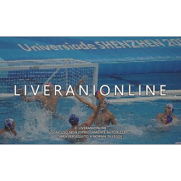 (110823) -- SHENZHEN, Aug. 23, 2011 () -- Goalkeeper Branislav Mitrovic of Serbia defends during men\'s water polo gold medal match at the 26th Summer Universiade in Shenzhen, a city of south China\'s Guangdong Province, on Aug. 23, 2011. Serbia beat Russia 11-8 to win the gold. (/Lin Yiguang)(wx)