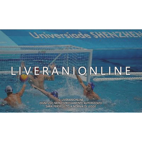 (110823) -- SHENZHEN, Aug. 23, 2011 () -- Goalkeeper Victor Ivanov of Russia defends during men\'s water polo gold medal match at the 26th Summer Universiade in Shenzhen, a city of south China\'s Guangdong Province, on Aug. 23, 2011. Russia lost Serbia 8-11 to win the silver. (/Lin Yiguang)(wx)