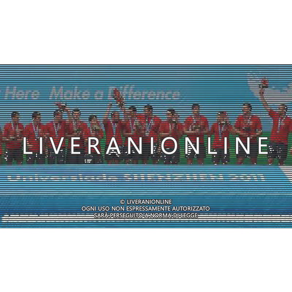 (110823) -- SHENZHEN, Aug. 23, 2011 () -- Bronze medalist Macedonia\'s team reacts during the awarding ceremony of men\'s water polo at the 26th Summer Universiade in Shenzhen, a city of south China\'s Guangdong Province, on Aug. 23, 2011. Macedonia won the United States 10-7 to win the bronze. (/Lin Yiguang)(wx)