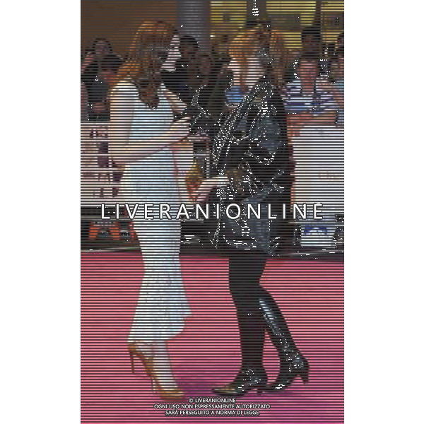 Anne Hathaway arriving at the European Premiere for \'One Day\' at Vue cinema, Westfield shopping centre, Shepherds Bush, London 23 August 2011 picture by Marc Larkin/Photoshot.