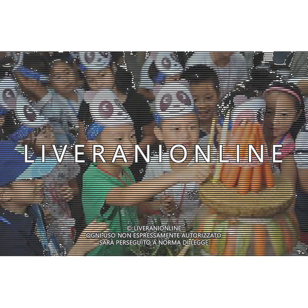HANGZHOU, Aug. 24, 2011 Children add bamboo shoots on the \'birthday cake\' during the birthday party of giant panda Ya Lin and Shu Yun in the Zoo of Hangzhou, east China\'s Zhejiang Province, Aug. 24, 2011. Over ten children born in August were invited to the Zoo of Hangzhou on Wednesday to celebrate the 3rd birth anniversary of giant panda Shu Yun and Ya Lin, who were born in August, 2008 in Chengdu. (/Huang Zongzhi) (zgp)