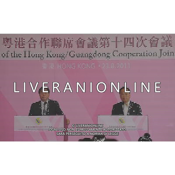(110823) -- HONG KONG, Aug. 23, 2011 () -- Hong Kong Chief Executive Donald Tsang (R) and Guangdong Governor Huang Huahua address the media in Hong Kong, south China, Aug. 23, 2011. The press conference was held following the 14th Plenary of the Hong Kong/Guangdong Cooperation Joint Conference in Hong Kong. (/Wong Pun Keung) (ry)