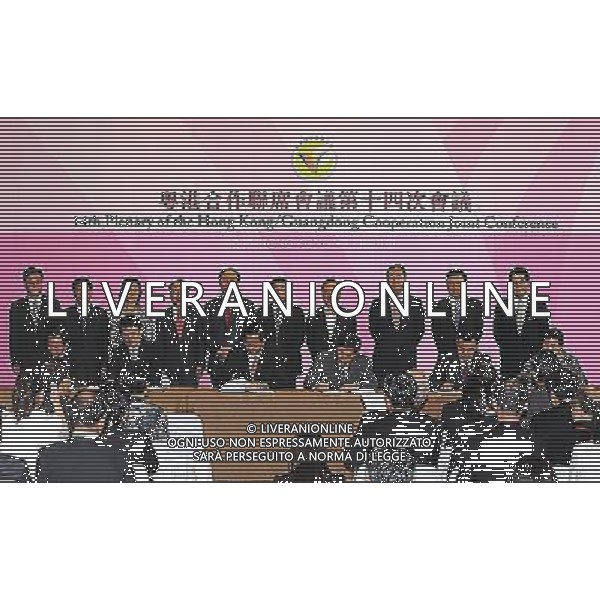 (110823) -- HONG KONG, Aug. 23, 2011 () -- Hong Kong Chief Executive Donald Tsang (4th R) and Guangdong Governor Huang Huahua (5th R) attend a signing ceremony on six cooperation agreements between the two sides in Hong Kong, south China, Aug. 23, 2011. The agreements were signed following the 14th Plenary of the Hong Kong/Guangdong Cooperation Joint Conference in Hong Kong. (/Wong Pun Keung) (ry)