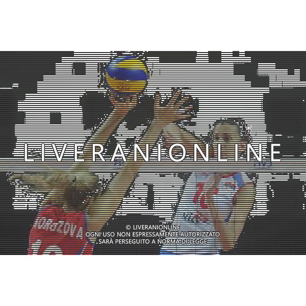 (110825) -- MACAO, Aug. 25, 2011 () -- Serbian player Milena Rasic (R) spikes the ball during the group A match against Russia at 2011 FIVB World Grand Prix in Macao, south China, Aug. 25, 2011. Serbia won 3-1. (/Cheong Kam Ka)