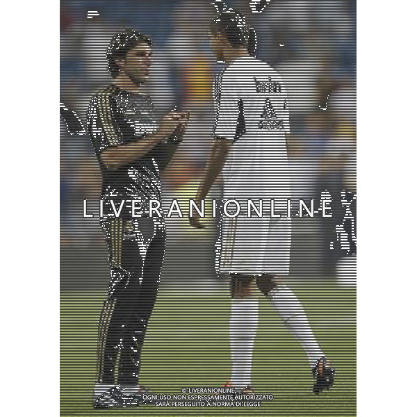 Real Madrid\'s second coach Aitor Karanka and Raphael Varane during Santiago Bernabeu Cup on august 24th 2011. Photo: Cesar Cebolla / ALFAQUI