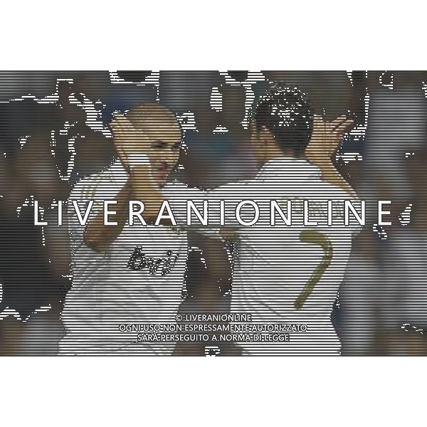 Real Madrid\'s Karim Benzema celebrates goal with Cristiano Ronaldo during Santiago Bernabeu Cup on august 24th 2011. Photo: Cesar Cebolla / ALFAQUI