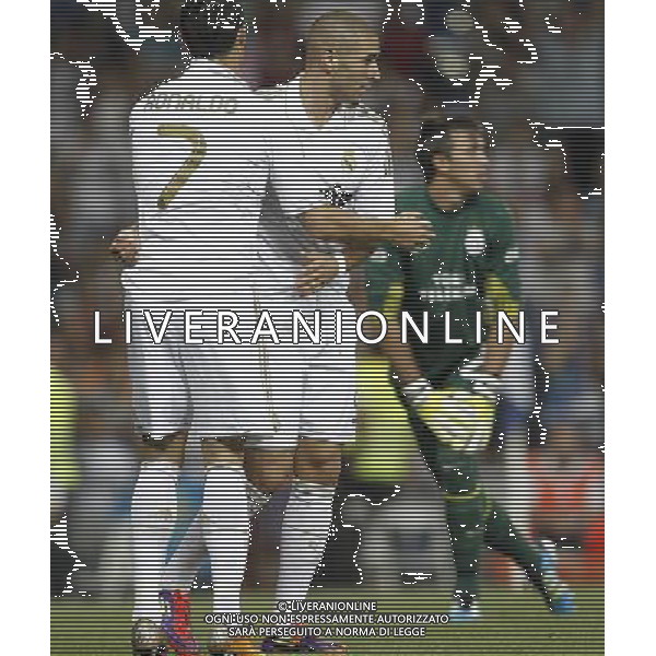 Real Madrid\'s Karim Benzema celebrates goal with Cristiano Ronaldo during Santiago Bernabeu Cup on august 24th 2011. Photo: Cesar Cebolla / ALFAQUI