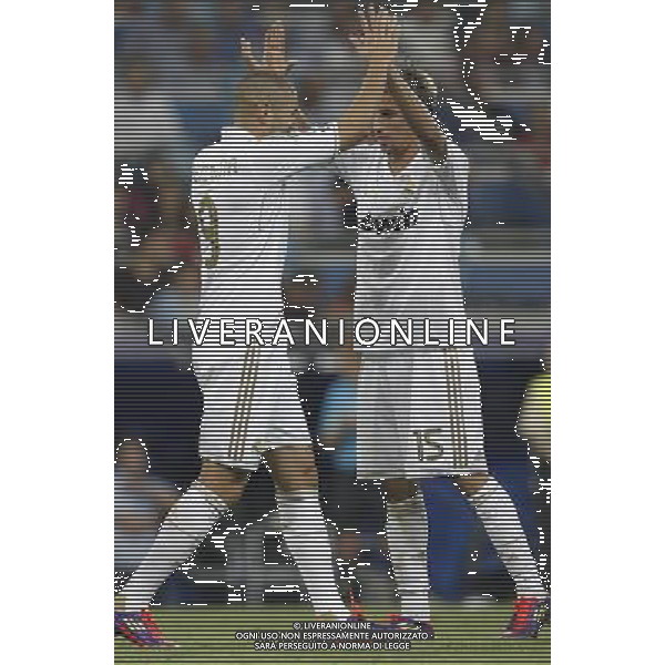 Real Madrid\'s Karim Benzema celebrates goal with Fabio Coentrao during Santiago Bernabeu Cup on august 24th 2011. Photo: Cesar Cebolla / ALFAQUI