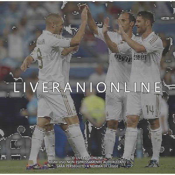 Real Madrid\'s Karim Benzema celebrates goal with Xabi Alonso and Ricardo Carvalho during Santiago Bernabeu Cup on august 24th 2011. Photo: Cesar Cebolla / ALFAQUI