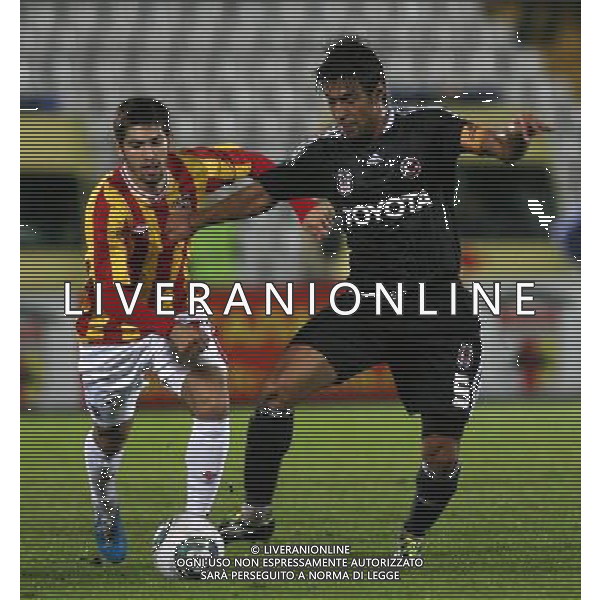 UEFA Europa League play off second leg soccer match between Alania Vladikavkaz and Besiktas at Republican Spartak stadium, in Vladikavkas, Russia, 25 August 2011. Match Scored: Alania 2 - Besiktas 0 Pictured: Roland Gigolaev (L) of Alania and Ibrahim Toraman (R) of Besiktas. / Europa League - Alania- Besiktas AG. ALDO LIVERANI SAS- ITALY ONLY *** Local Caption *** .