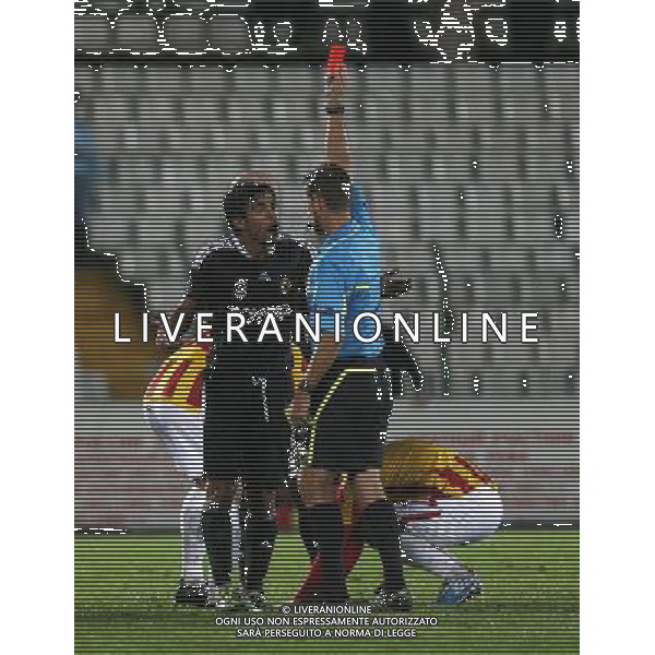 UEFA Europa League play off second leg soccer match between Alania Vladikavkaz and Besiktas at Republican Spartak stadium, in Vladikavkas, Russia, 25 August 2011. Match Scored: Alania 2 - Besiktas 0 Pictured: Referee Alexandru Dan Tudor and Ibrahim Toraman of Besiktas. / Europa League - Alania- Besiktas AG. ALDO LIVERANI SAS- ITALY ONLY *** Local Caption *** .
