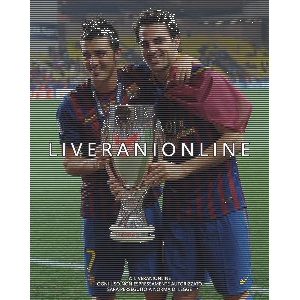 UEFA Supercoppa Europea 2011 Montecarlo - 26.08.2011 Barcellona-Porto Nella Foto:fabregas e villa con la coppa /Ph.Vitez-Ag. Aldo Liverani