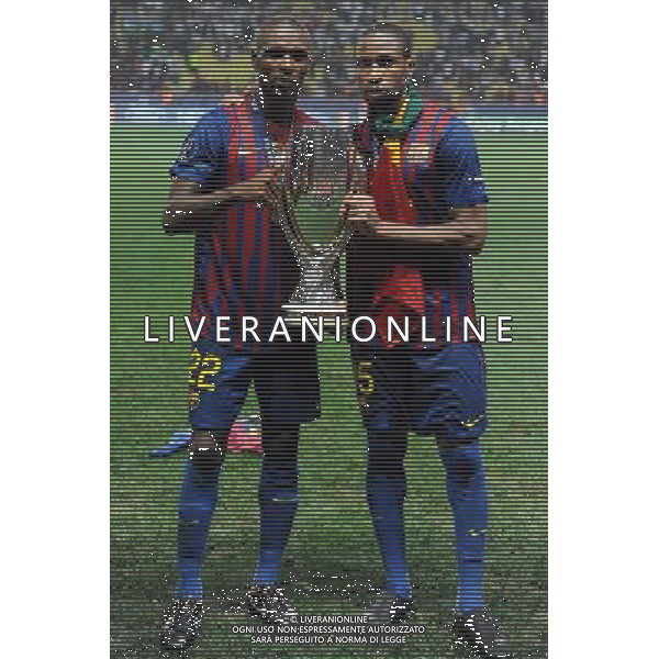 UEFA Supercoppa Europea 2011 Montecarlo - 26.08.2011 Barcellona-Porto Nella Foto:keita e abidal con la coppa /Ph.Vitez-Ag. Aldo Liverani