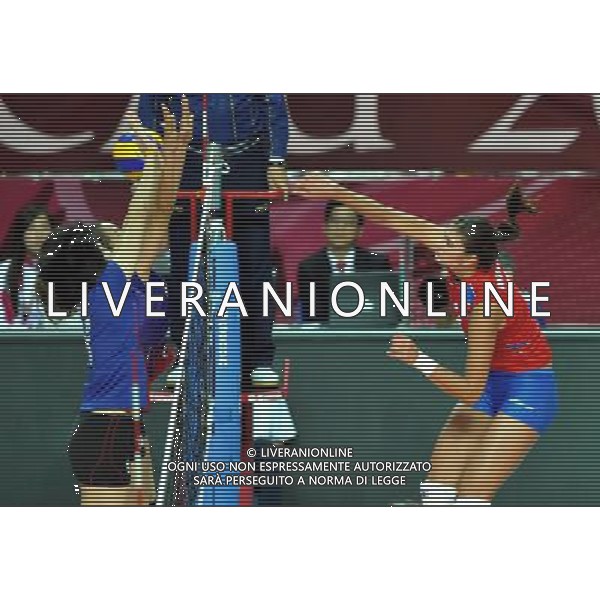 MACAO, Aug. 26, 2011 Serbian player Jovana Brakocevic (R) spikes the ball during the group A match against Thailand at 2011 FIVB World Grand Prix in Macao, south China, Aug. 26, 2011. Serbia won 3 0. (/Lo Ping Fai)