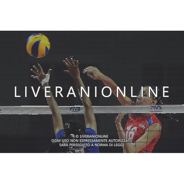 MACAO, Aug. 26, 2011 Serbian player Milena Rasic (R) spikes the ball during the group A match against Thailand at 2011 FIVB World Grand Prix in Macao, south China, Aug. 26, 2011. Serbia won 3 0. (/Cheong Kam Ka)