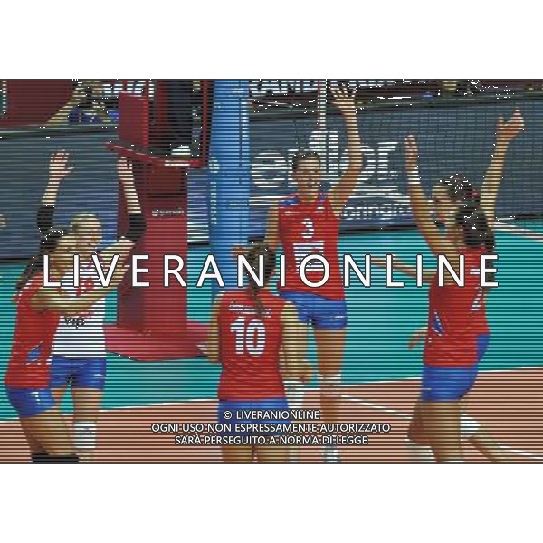 MACAO, Aug. 26, 2011 Serbian players cheer for a point during the group A match against Thailand at 2011 FIVB World Grand Prix in Macao, south China, Aug. 26, 2011. Serbia won 3 0. (/Lo Ping Fai)