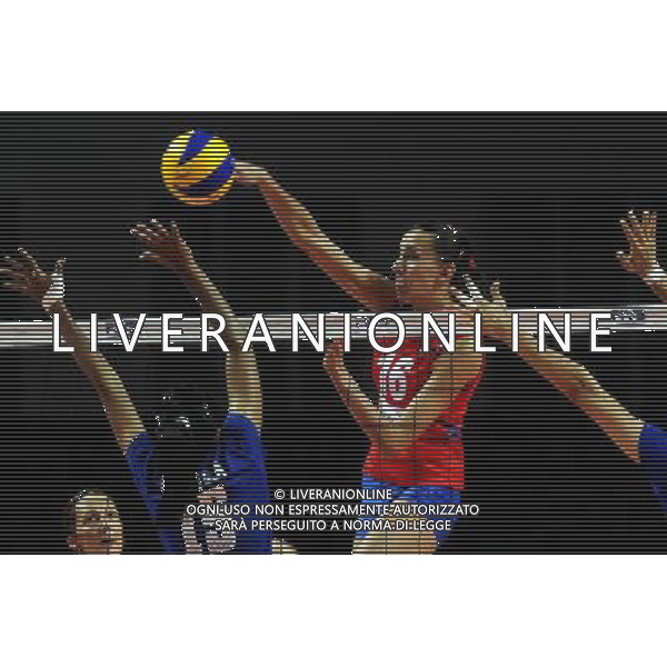 MACAO, Aug. 26, 2011 Serbian player Milena Rasic (R) spikes the ball during the group A match against Thailand at 2011 FIVB World Grand Prix in Macao, south China, Aug. 26, 2011. Serbia won 3 0. (/Cheong Kam Ka)