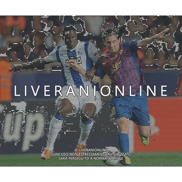 UEFA Supercoppa Europea 2011 Montecarlo - 26.08.2011 Barcellona-Porto Nella Foto:Lionel Messi-Silvestre Varela /Ph.Vitez-Ag. Aldo Liverani