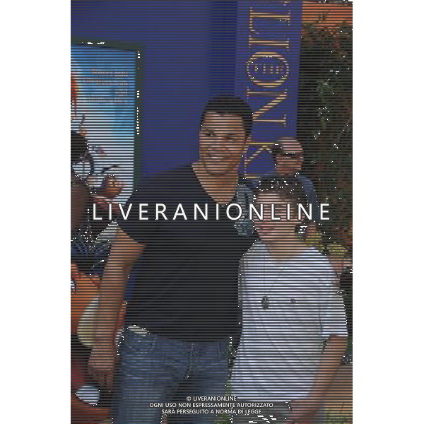 HOLLYWOOD, CA - AUGUST 27: Geno Segers and Ryan Ochoa arrive at \'The Lion King\' Los Angeles 3D Premiere at the El Capitan Theatre on August 27, 2011 in Hollywood, California.