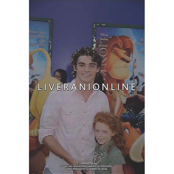 HOLLYWOOD, CA - AUGUST 27: RJ Mitte and Lacianne Carriere arrive at \'The Lion King\' Los Angeles 3D Premiere at the El Capitan Theatre on August 27, 2011 in Hollywood, California.