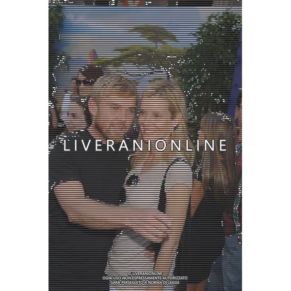 HOLLYWOOD, CA - AUGUST 27: Rick Schroder and Andrea Schroder arrive at \'The Lion King\' Los Angeles 3D Premiere at the El Capitan Theatre on August 27, 2011 in Hollywood, California.