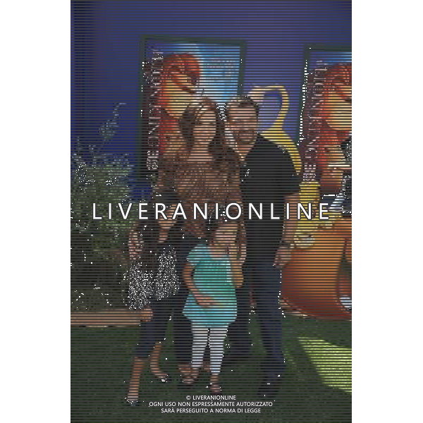 HOLLYWOOD, CA - AUGUST 27: Maria Canals-Barrera and family arrive at \'The Lion King\' Los Angeles 3D Premiere at the El Capitan Theatre on August 27, 2011 in Hollywood, California.