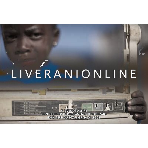 JOHANNESBURG , Sept. 01, 2011 5 year old Phelo poses with a cover plate of an electric equipment he just found in trash, in Motswaledi Informal settlement of Soweto, Johannesburg, South Africa, Aug. 24, 2011. Children in the shanty towns don\'t have fancy toys like transformers, barbies or remote control airplanes, but they have a lot of fun playing with a piece of wire, a ball, a discarded circuit board or even a piece of paper. These so called toys bring happiness to the children, though heart breaking it may seem to others. (/Fei Maohua) (xhn)