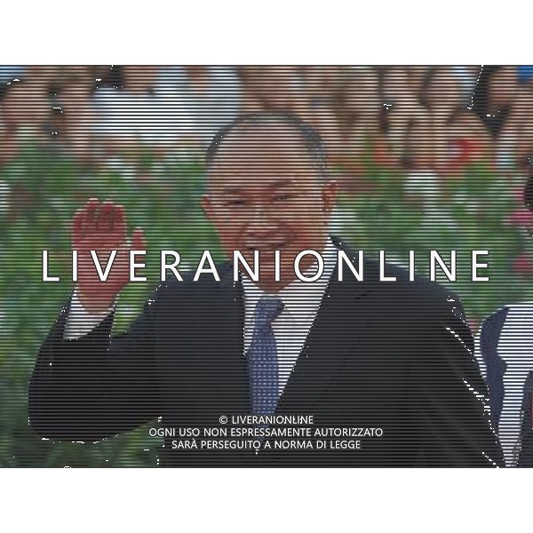 (110831) -- VENICE, Aug. 31, 2011 () -- Golden Lion Lifetime Achievement Award winner and producer of the film \'Saideke Balai (Seediq Bale)\' John Woo poses on the red carpet during the opening of the 68th Venice International Film Festival in Venice, Italy, Aug. 31, 2011. (/Wang Qingqin)