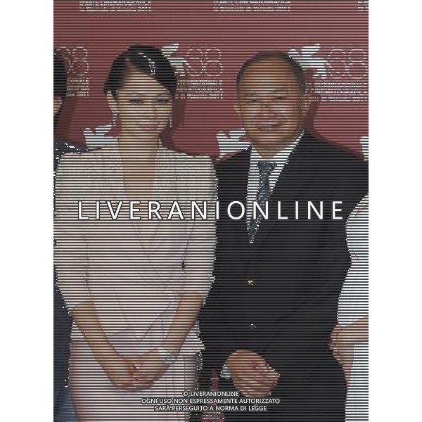 (110901) -- VENICE, Sept. 1, 2011 () -- Producer John Woo (R) and actress Vivian Hsu pose during the photo-call for the film \'Saideke Balai\' at the 68th Venice International Film Festival at Venice, Italy, Sept. 1, 2011. (/Wang Qingqin) (nxl)