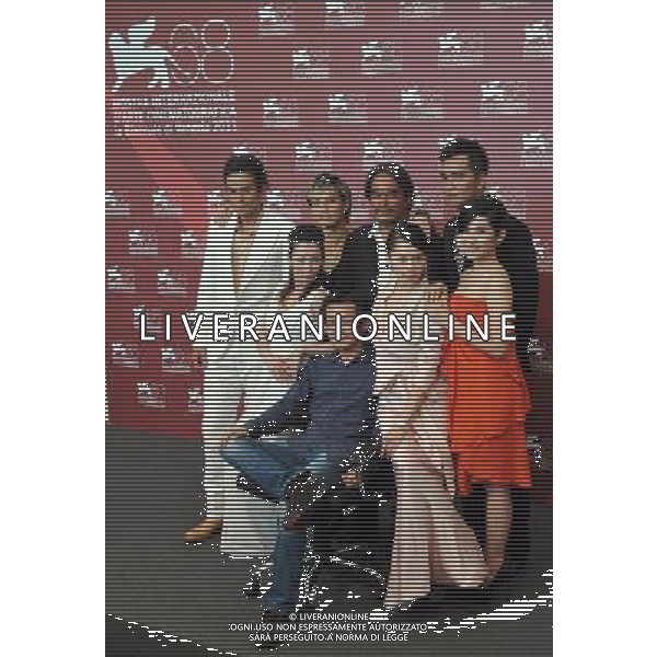(110901) -- VENICE, Sept. 1, 2011 () -- Director Wei Te-Sheng (sitting in chair) and cast members pose during the photo-call for the film \'Saideke Balai\' at the 68th Venice International Film Festival at Venice, Italy, Sept. 1, 2011. (/Wang Qingqin) (nxl)