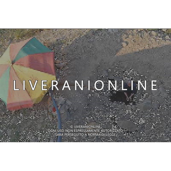 (110908) -- TIANLIN, Sept. 8, 2011 () -- Meng Xiaode, a local villager, digs a water well for irrigation in the field in Pingman Village of Tianlin County, south China\'s Guangxi Zhuang Autonomous Region, Sept. 7, 2011. A total of 190,000 mu (about 12,667 hectares) of crops here have been affected by a serious drought, with 25,000 mu (about 1,667 hectares) totally fruitless. The drought has affected several counties as the average precipitation from July 1 to the end of August has fallen by 50 percent year on year to 228 millimeters, the least since 1951. (/Zhou Hua) (lfj)