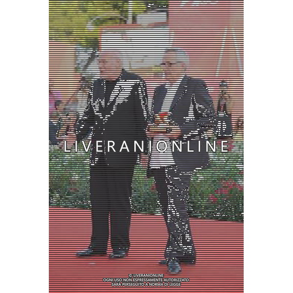 09/09/2011 VENEZIA 68ma Mostra del cinema nella foto il regista marco bellocchio con il leone d\'oro e marco muller ph.gandolfi /ag ALDO LIVERANI sas