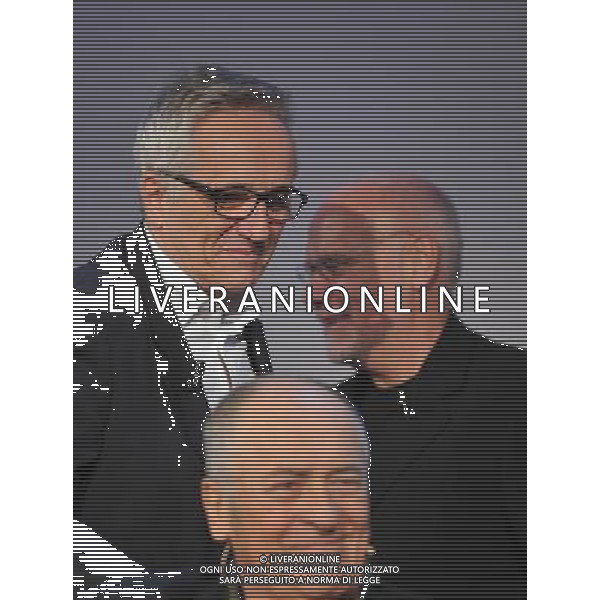 (110909) -- VENICE, Sept. 9, 2011 () -- Italian director Bernardo Bertolucci (front) and Marco Muller (R), President of the Venice Film Festival, attend the awarding ceremony for Italian filmmaker Marco Bellocchio (L) at the 68th Venice International Film Festival in Venice, Italy, Sept. 9, 2011. Bellocchio was awarded the Golden Lion for Lifetime Achievement on Friday. (/Wang Qingqin) (hdt)