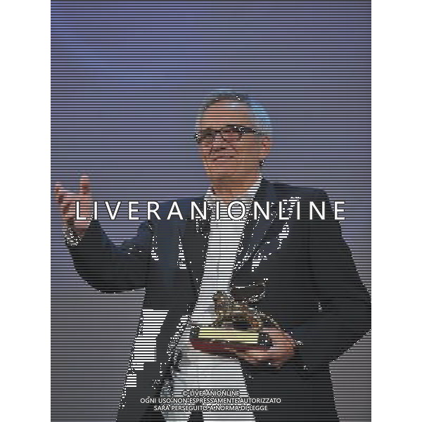 (110910) -- VENICE, Sept. 10, 2011 () -- Italian filmmaker Marco Bellocchio is awarded the Golden Lion for Lifetime Achievement at the 68th Venice International Film Festival in Venice, Italy, Sept. 9, 2011. (/Wang Qingqin) (hdt)
