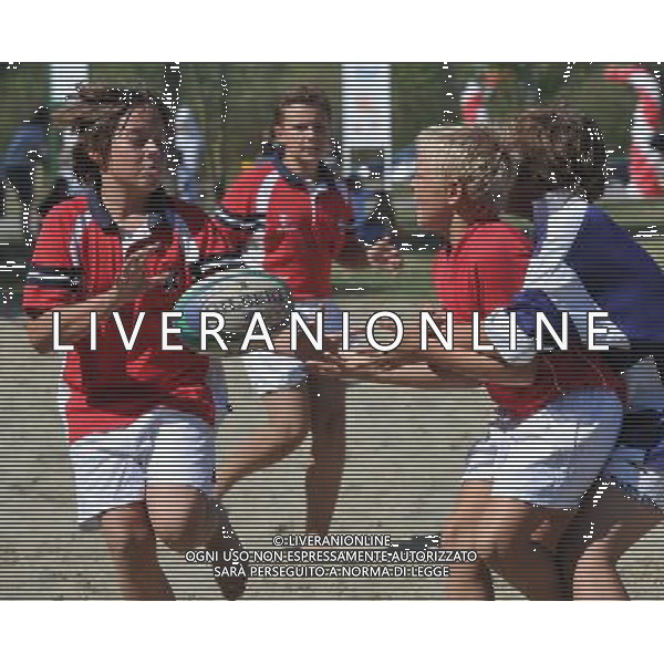 (110910) -- ZAGREB, Sept. 10, 2011 () -- Boys play rugby during a celebration to mark the 20th founding anniversary of the Croatian Olympic Committee at Jarun Lake in Zagreb, Croatia, Sept. 10, 2011. The Croatian Olympic Committee was founded in Zagreb on Sept. 10, 1991. (/Miso Lisanin)