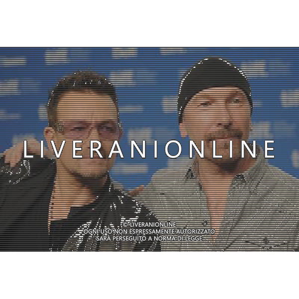 Picture Shows: Bono and The Edge attending the press conference for \'Beyond The Sky\'. Held at the Bell Lightbox during the 2011 Toronto International Film Festival on Friday September 09, 2011, Toronto, Canada. .
